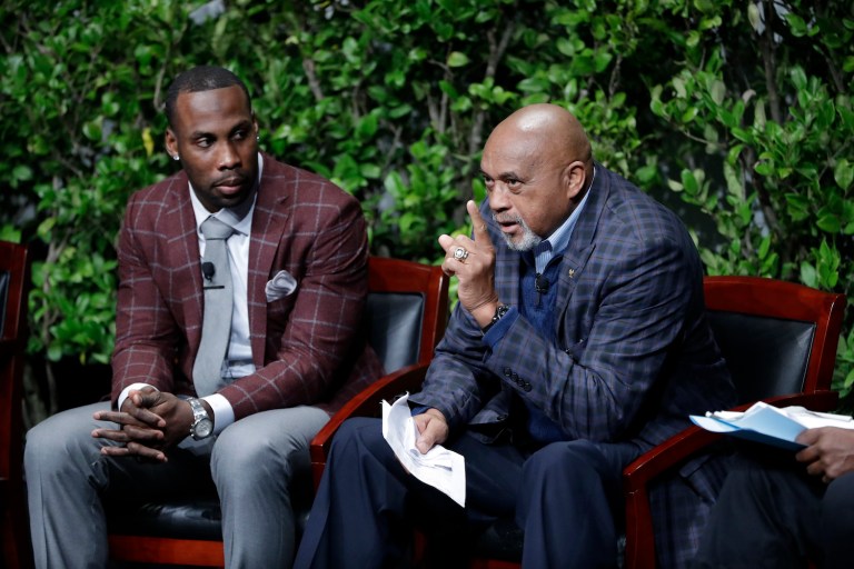 Anquan Boldin (right), Malcolm Jenkins, Johnson Bademosi and Donte Stallworth spoke to a forum on Capitol Hill. (AP Photo/Marcio Jose Sanchez)