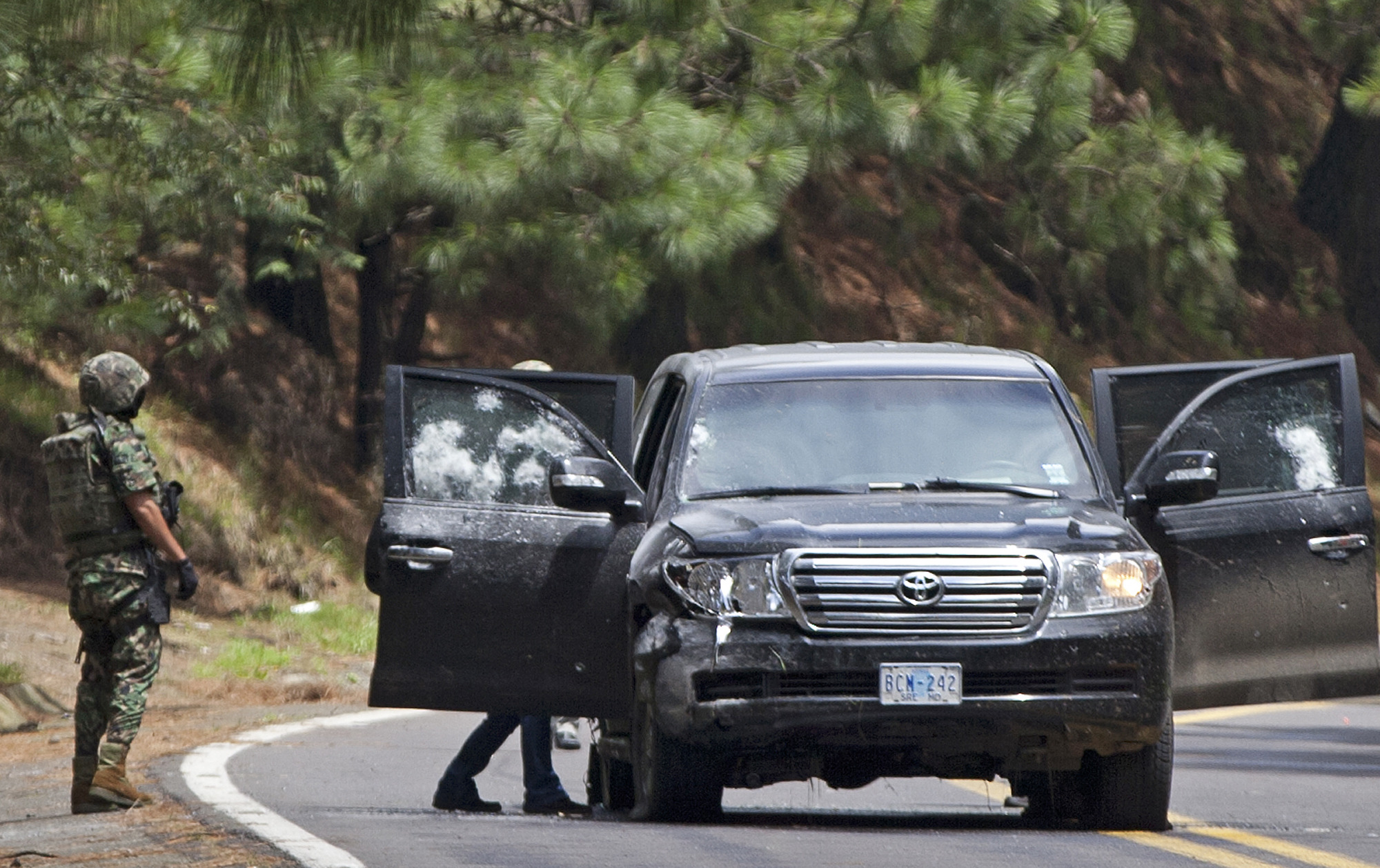 Mexico: 14 police on trial for US SUV shooting