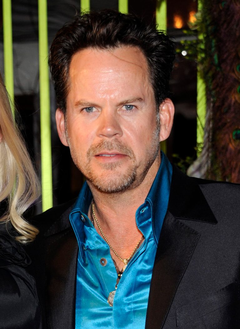   FILE - This Nov. 8, 2011 file photo shows country singer Gary Allan at the 59th Annual BMI Country Awards in Nashville. Allan was supposed to perform in Atlantic City, N.J., the day after Hurricane Sandy hit. He never made it, but his thoughts remain with victims of the storm, so he's come up with a way to help. Fans can view the video for Allan's new single âEvery Storm (Runs Out of Rain)â on the country singer's web site beginning Tuesday, Dec. 4, 2012, on a special player. The player gives fans a chance to donate to the Red Cross. In return, donors get a free download of the song from Allan's untitled new album due out next year. Scores of artists have reached out to help raise money in the wake of the superstorm, which killed dozens and caused billions of dollars in damage in the northeastern U.S. (AP Photo/Evan Agostini, file)  