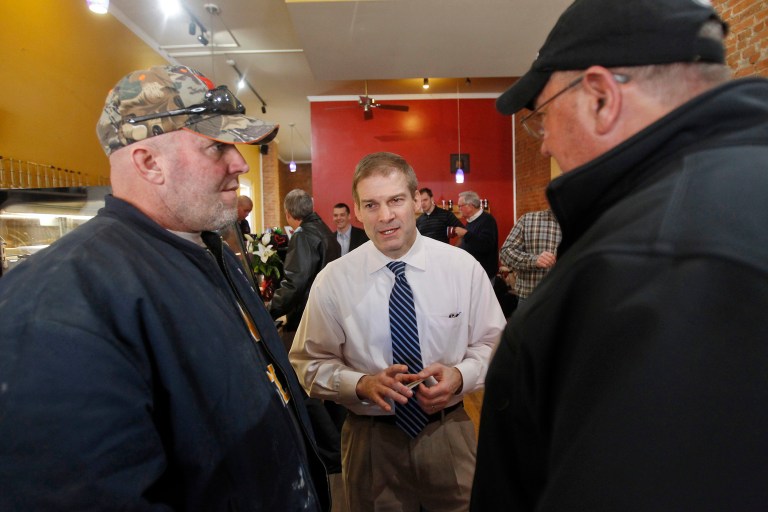 In this photo taken March 12, 2015, Rep. Jim Jordan, R-Ohio, center, talks with Phil Shank, left, and Kurt Emans, at Common Grounds Coffehouse and Cafe in Bluffton, Ohio. His Freedom Caucus, numbering perhaps 30 Republicans, wants to help Republicans negotiate tough issues as close to conservative principles as possible. (AP Photo/J.D. Pooley)An advocate of traditional marriage protests in front of the U.S. Federal Courthouse March 3, 2014 in Detroit, Michigan. (Photo by Bill Pugliano/Getty Images)
