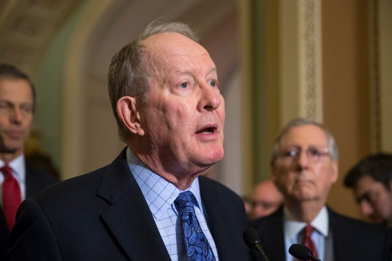 Sen. Lamar Alexander is joined by Sen. Mitch McConnell as he speaks to reporters after the Senate voted overwhelmingly to end debate on the makeover to No Child Left Behind, setting up a final vote Wednesday. (AP Photo/J. Scott Applewhite)