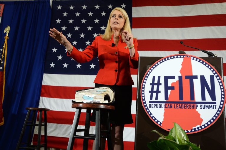 Former New York Lt. Gov. Betsy McCaughey, standing in front of the Affordable Care Act bill, speaks at the First in the Nation Republican Leadership Summit April 18, 2015 in Nashua, New Hampshire. (Photo by Darren McCollester/Getty Images)