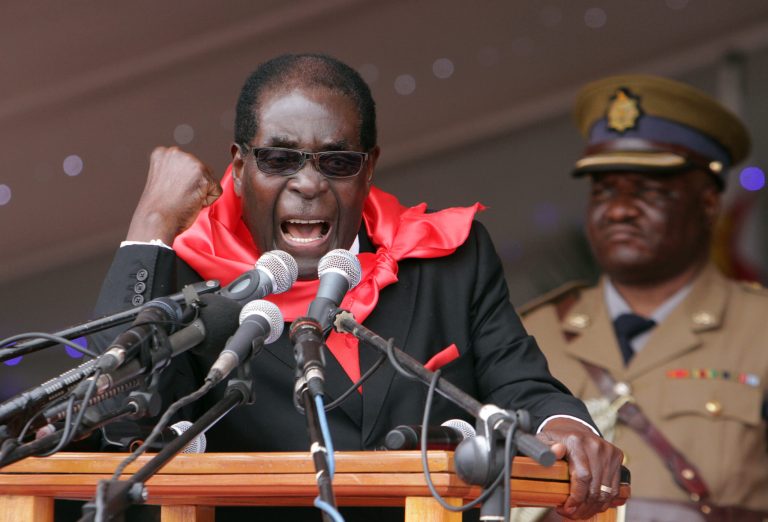 Zimbabwe's President Robert Mugabe delivers his speech during celebrations to mark his 90th birthday in Marondera about 100 kilometres east of  Harare, Sunday, Feb. 23, 2014. Mugabe who is Africa's oldest leader has been  in power in the Southern African nation since 1980. (AP (AP Photo/Tsvangirayi Mukwazhi)