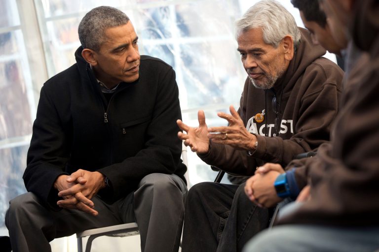 President Barack Obama, left, listens to Eliseo Medina, right, Secretary-Treasurer of Service Employees International Union (SEIU), as he meets with individuals who are taking part in Fast for Families on the National Mall in Washington, Friday, Nov. 29, 2013. Obama met with the group who are fasting on behalf of immigration reform. (AP Photo/Pablo Martinez Monsivais)