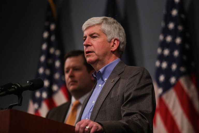 Gov. Rick Snyder speaks during a news conference Wednesday, Jan. 22, 2014, in Lansing, Mich, where he annoucned a plan to commit $350 million in state funds to help shore up Detroit's pension funds and prevent valuable city-owned art from being sold during the debt-ridden city's bankruptcy. (AP Photo/Detroit Free Press, Ryan Garza )  DETROIT NEWS OUT;  NO SALES, TV OUT, MADATORY CREDIT