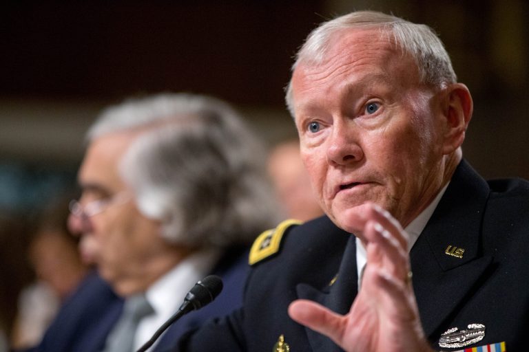 Former Chairman of the Joint Chiefs of Staff Martin Dempsey sent out a rare tweet Thursday praising the U.S. intelligence agents at a time when the incoming president has repeatedly questioned the intelligence community's integrity and ability. (AP Photo/Andrew Harnik)