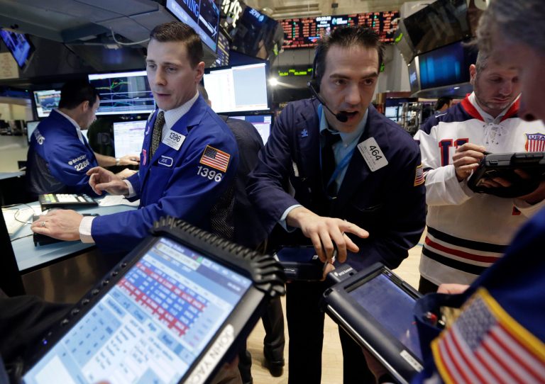 Traders work on the floor of the New York Stock Exchange on Feb. 21. (AP Photo/Richard Drew)