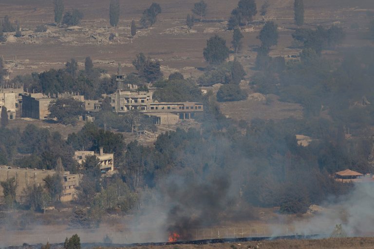 Smoke and fire rise in the Quneitra province as Syrian rebels clash with President Bashar Assad's forces, as seen from the Israeli controlled-Golan Heights, Wednesday. (AP/Ariel Schalit)