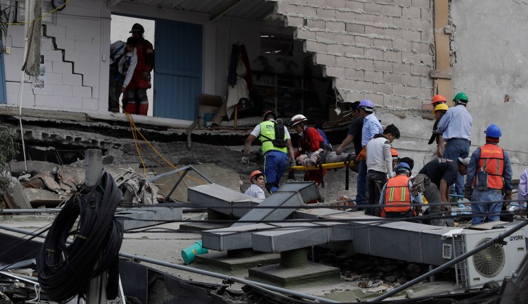 A 7.1 magnitude earthquake with an epicenter about 75 miles southeast of Mexico City shook buildings across the city on Tuesday, killing at least two people according to initial reports. (AP Photo/Rebecca Blackwell)