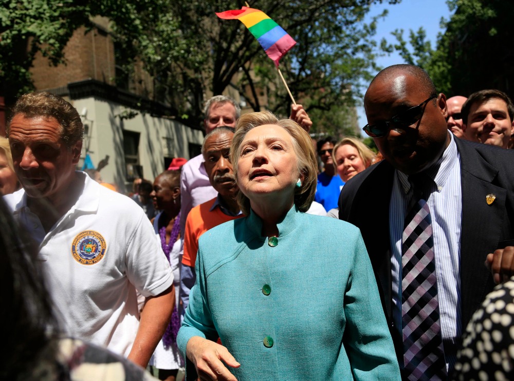 Clinton marches in New York City gay pride parade