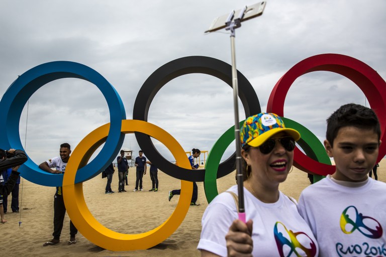 The estimated 350,000-500,000 visitors and athletes expected to travel to the Olympic games, which start next week, make up only a tiny fraction of travelers to Zika-affected countries. (Dado Galdieri/Bloomberg)