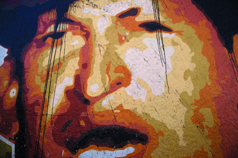 A mural depicting Venezuela's President Hugo Chavez in Caracas, Venezuela, Thursday, Jan. 3, 2013. The ailing president's health crisis has raised contentious questions ahead of the swearing-in set for Jan. 10, including whether the inauguration could legally be postponed. Officials have raised the possibility that Chavez might not be well enough to take the oath of office, without saying what will happen if he can't. The constitution says that if a president or president-elect dies or is declared unable to continue in office, presidential powers should be held temporarily by the president of the National Assembly and that a new presidential vote should be held within 30 days. (AP Photo/Ariana Cubillos)