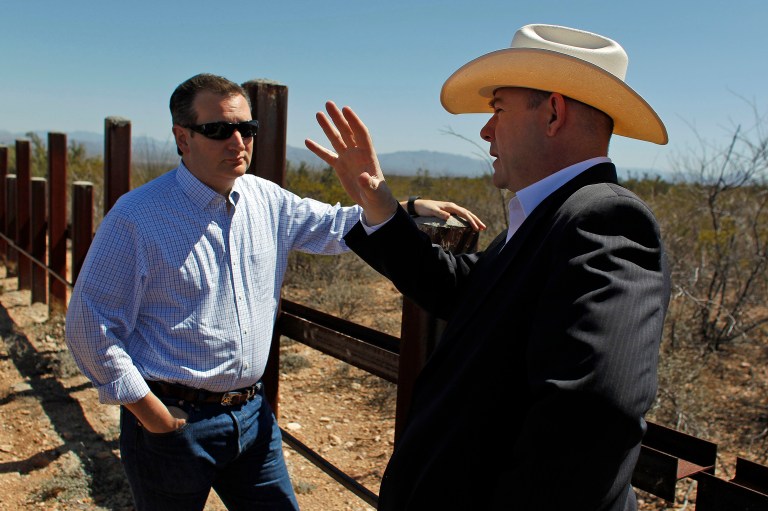Ted Cruz, left, during a visit to the Arizona south border with Mexico in Douglas, Ariz., Friday, March 18, 2016. (AP Photo/Ricardo Arduengo)