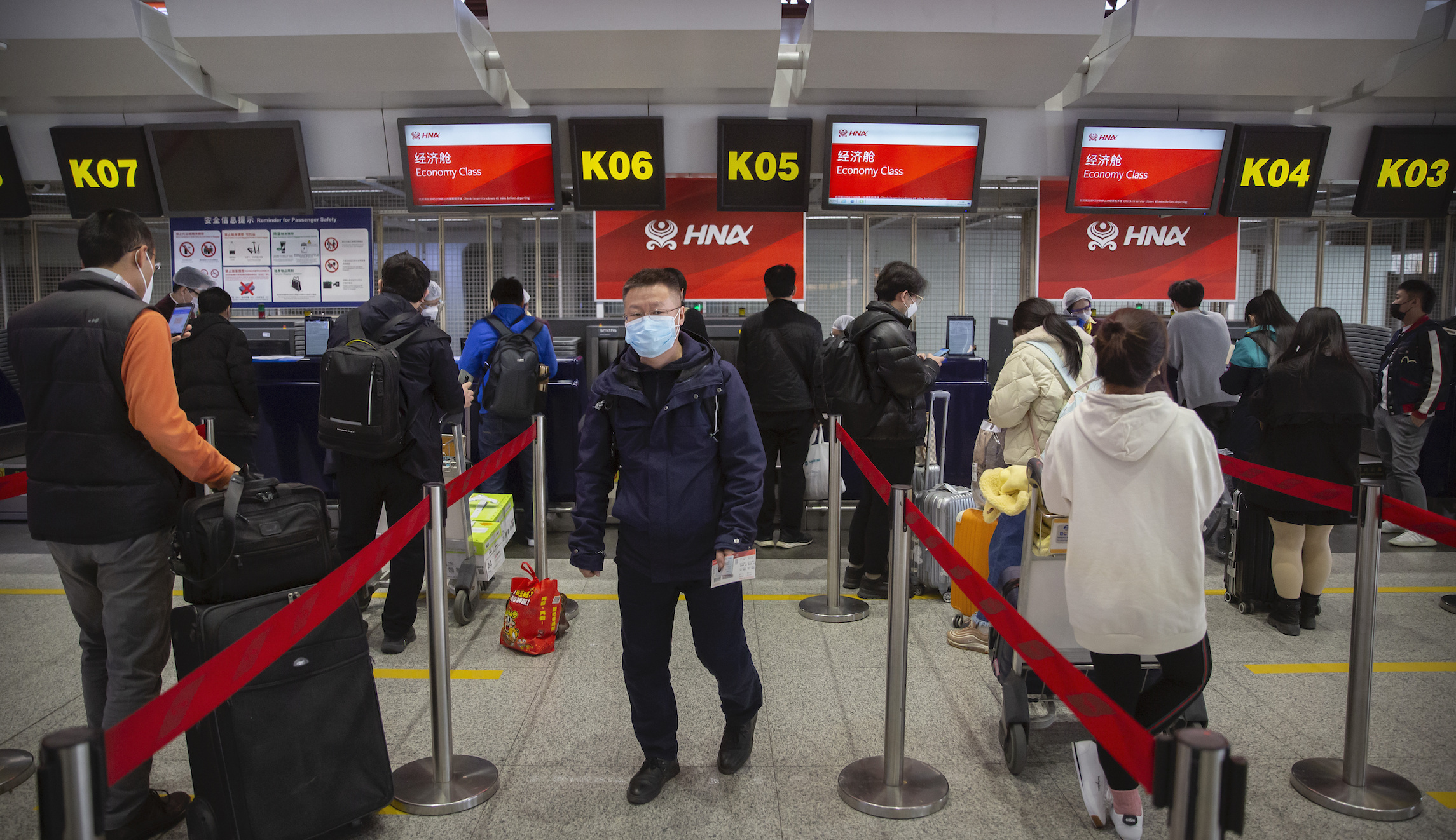 Woman who flew from US to China for coronavirus test faces years in prison