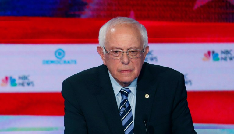 Democratic presidential candidate former vice president Joe Biden, left, speaks during the Democratic primary debate hosted by NBC News at the Adrienne Arsht Center for the Performing Arts, Thursday, June 27, 2019, in Miami, as Sen. Bernie Sanders, I-Vt., listens.