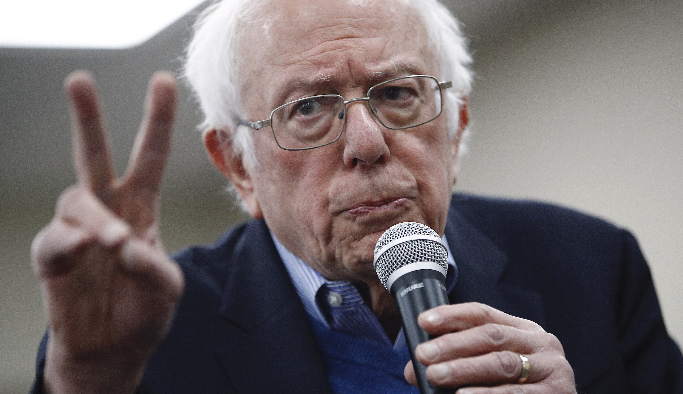 Second-choice Sanders goes on offensive to win voters from Biden
