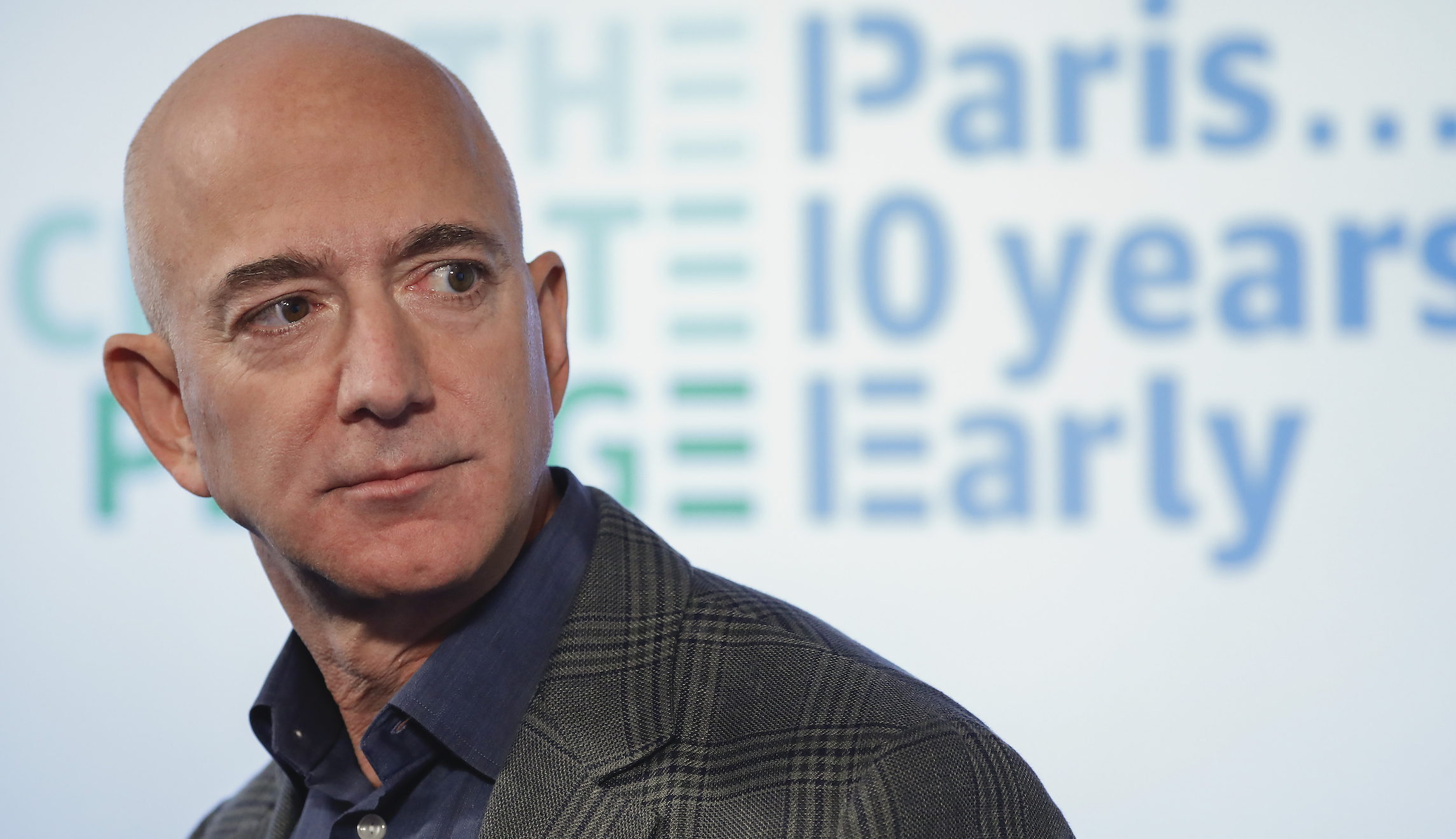 Activists set up guillotine outside DC home of Jeff Bezos during protest of Amazon