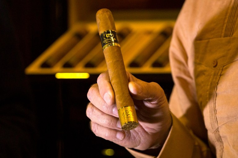 Lawmakers are seeking to reverse the Obama administration's ban on sending cigars to American service members stationed overseas. (AP Photo/Desmond Boylan)