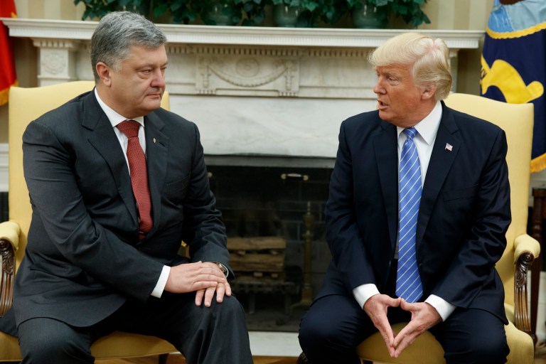 Trump's Treasury Department issued a fresh round of sanctions on Russian and Russian-backed Ukrainian individuals on Tuesday before Poroshenko met extensively with Vice President Mike Pence and briefly with President Trump. (AP Photo/Evan Vucci)
