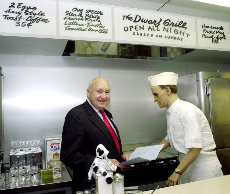 FILE - In this Nov. 8, 2001, file photo, S. Truett Cathy, founder of Chick-fil-A, poses in a replica of 