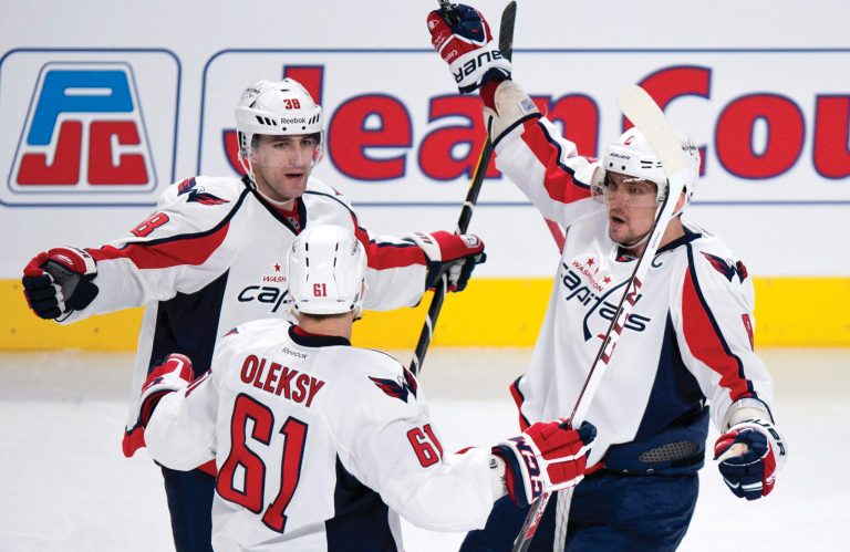 Paul Chiasson/AP/Canadian Press
Jack Hillen, left, scored his first goal in more than a year Tuesday night to help the Capitals beat the Canadiens for their fifth consecutive victory.