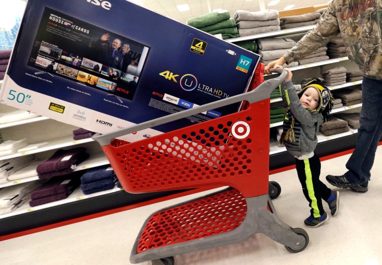 Big TV's and athletic shoes were big sellers on Black Friday. (AP Photo/Elise Amendola)