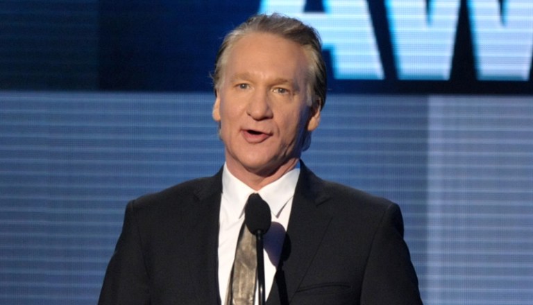 Bill Maher presents the Icon award on stage at the American Music Awards at the Nokia Theatre L.A. Live on Sunday, Nov. 24, 2013, in Los Angeles. (Photo by John Shearer/Invision/AP)