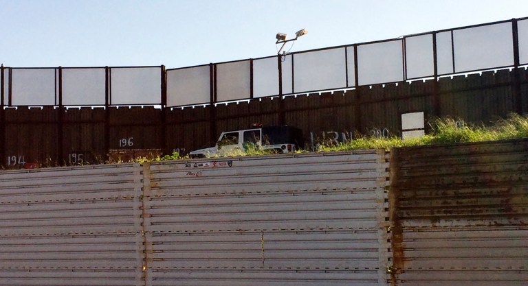 James Carafano, who headed Trump's Homeland Security transition team, said he expects to see construction of the wall soon, but the kind of barrier and the exact location will depend on many different factors and won't necessarily result in a continuous wall along the Mexican border. (AP Photo/Julie Watson)