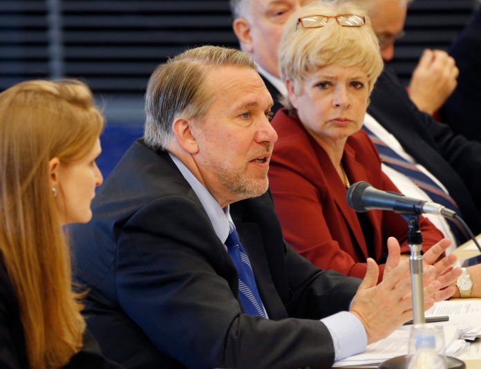 The comments on Wednesday were directed at Christopher Painter, the State Department's coordinator for cyberissues, during a panel of the Senate Foreign Relations Committee. (AP Photo/Koji Sasahara)