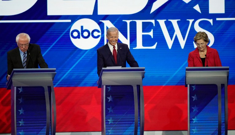 From left, presidential candidates Sen. Bernie Sanders, I-Vt., former Vice President Joe Biden and Sen. Elizabeth Warren, D-Mass., take their places Thursday, Sept. 12, 2019, before a Democratic presidential primary debate hosted by ABC at Texas Southern University in Houston. 