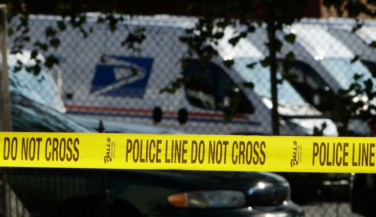Police tape cordons off a post office in Wilmington, Del., Thursday, Oct. 25, 2018.  A law enforcement official said suspicious packages addressed to former Vice President Joe Biden  were intercepted at Delaware mail facilities in New Castle and Wilmington and were similar to crude pipe bombs sent to former President Barack Obama, Hillary Clinton and CNN.