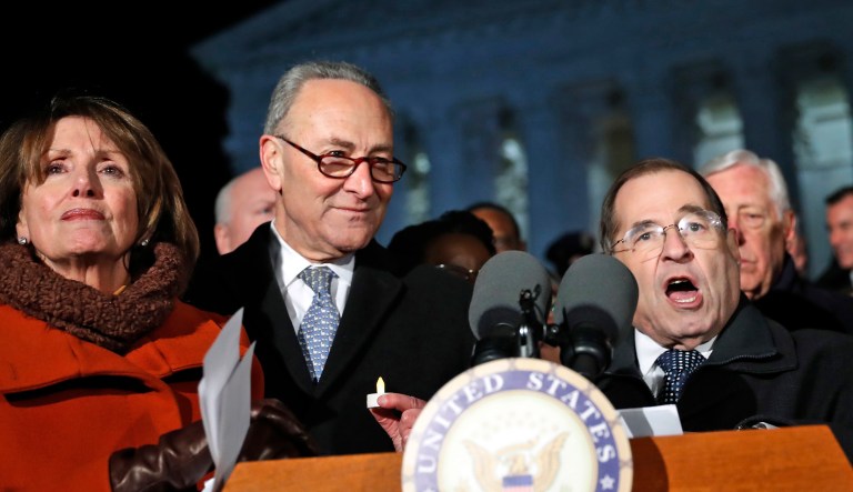 House Minority Leader Nancy Pelosi of Calif., left, and Senate Minority Leader Chuck Schumer of New York stand as Rep. Jerrold Nadler, D- N.Y.