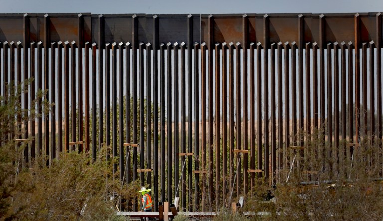 Rock climbers competing to scale ‘impossible to climb’ border wall