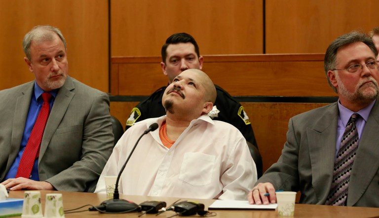 Luis Bracamontes, center, stares at the ceiling as the verdicts are read for the murder of two law enforcement officers, in Sacramento Superior Court Friday, Feb. 9, 2018, in Sacramento, Calif. Bracamontes was found guilty of shooting Sacramento County sheriffâs Deputy Danny Oliver in 2014, then killing Placer County sheriff's Detective Michael Davis Jr. hours later.