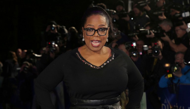 Oprah Winfrey poses for photographers upon arrival at the premiere of the film "A Wrinkle In Time" in London, Tuesday, March 13, 2018.