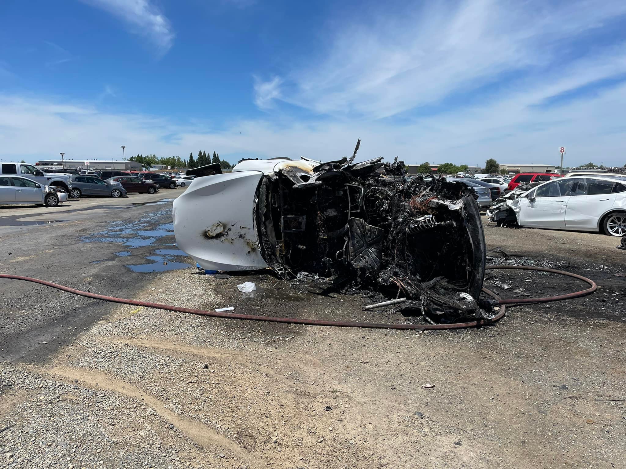 WATCH: Burning Tesla takes 4,500 gallons of water to extinguish