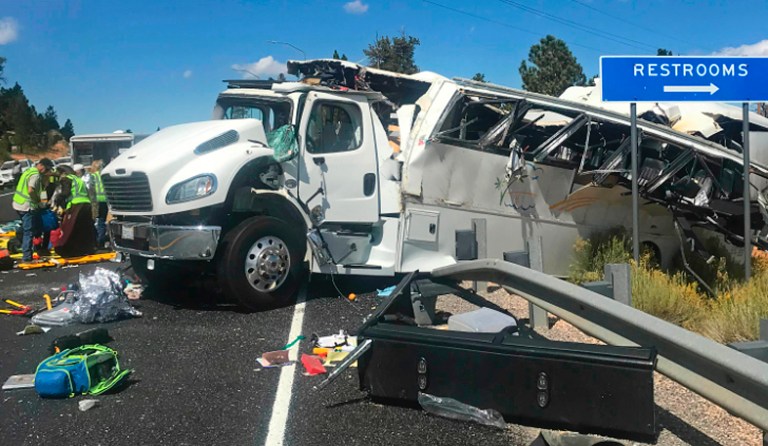 This photo released by the Garfield County Sheriff's Office shows a tour bus carrying Chinese-speaking tourists after it crashed near Bryce Canyon National Park in southern Utah, killing at least four people and critically injuring up to 15 others, Friday, Sept. 20, 2019.