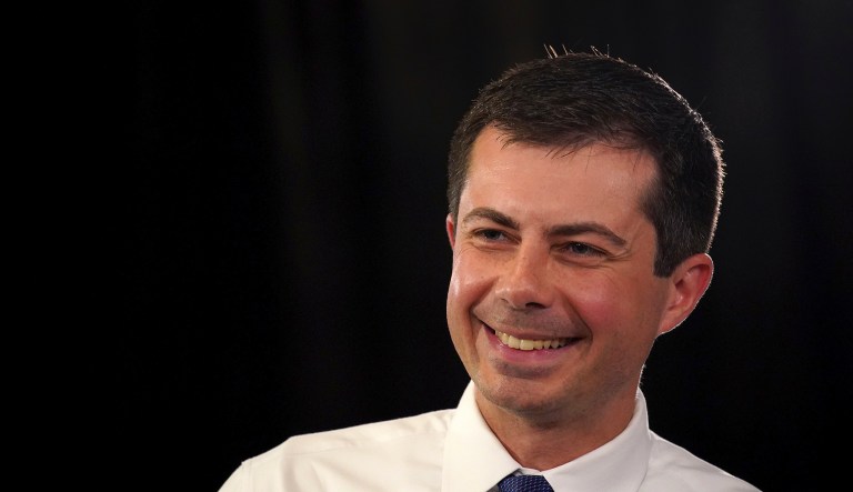 Democratic presidential candidate South Bend Mayor Pete Buttigieg smiles as he listens to a question from the audience during a Veteran's and Mental Health Town Hall event at an American Legion Hall, Friday, Aug. 23, 2019, in Manchester, N.H. 