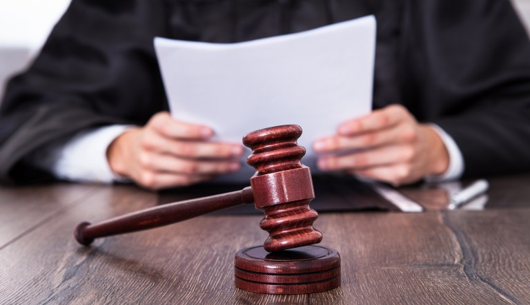 John Lipscombe, a Travis County judge since 2011, was charged with driving while intoxicated after reportedly attempting to back his car into an already occupied parking spot at a hotel in North Austin on Saturday around 12:30 a.m.