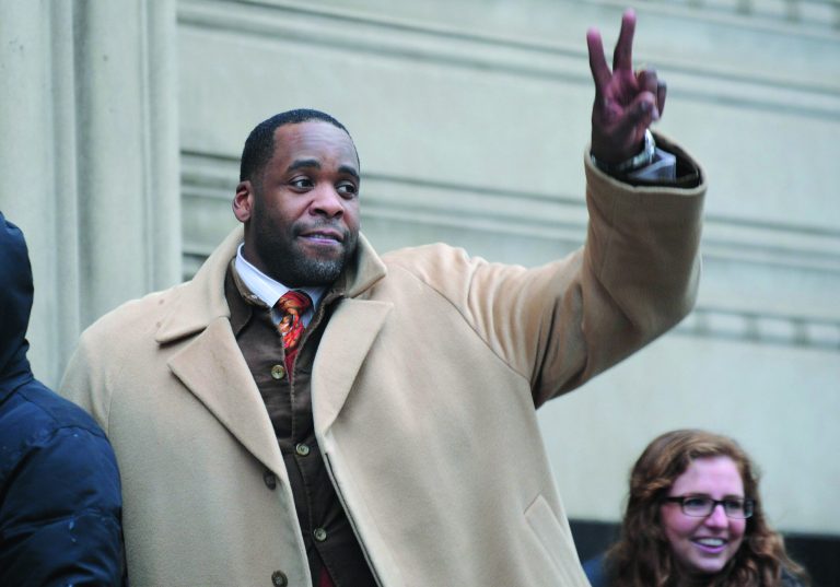 FILE - In this Jan. 29,2013 file photo former Mayor Kwame Kilpatrick waits in line to enter federal court in Detroit. Testimony in Kilpatrick's corruption trial ended Thursday, Feb. 6, 2013 after nearly 70 days of testimony. Kilpatrick offered no new witnesses Wednesday and closing arguments have been set for Monday in Detroit federal court. (AP Photo/The Detroit News, David Coates) DETROIT FREE PRESS OUT, HUFFINGTON POST OUT, NO MAGS, NO SALES, NO ARCHIVE, MANDATORY CREDIT