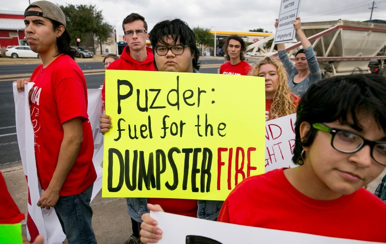 Activist group Fight for $15 held rallies at Carl's Jr. and Hardee's restaurants across the country Thursday. ( Jay Janner/Austin American-Statesman via AP)