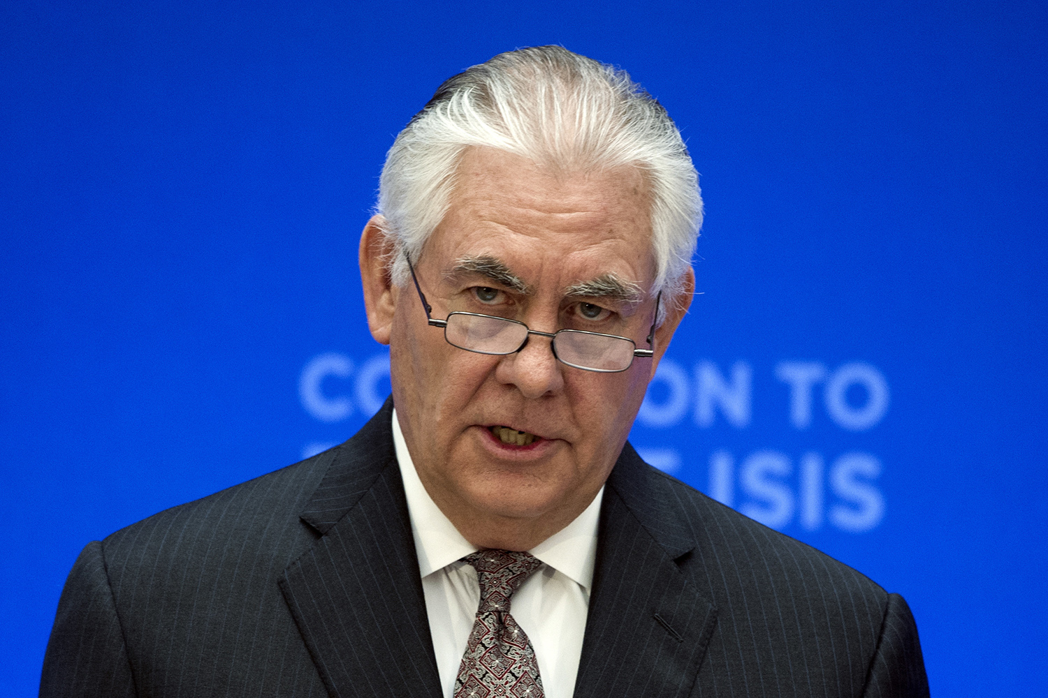 Rex Tillerson, at Nazi victims memorial, issues apparent warning to Bashar Assad