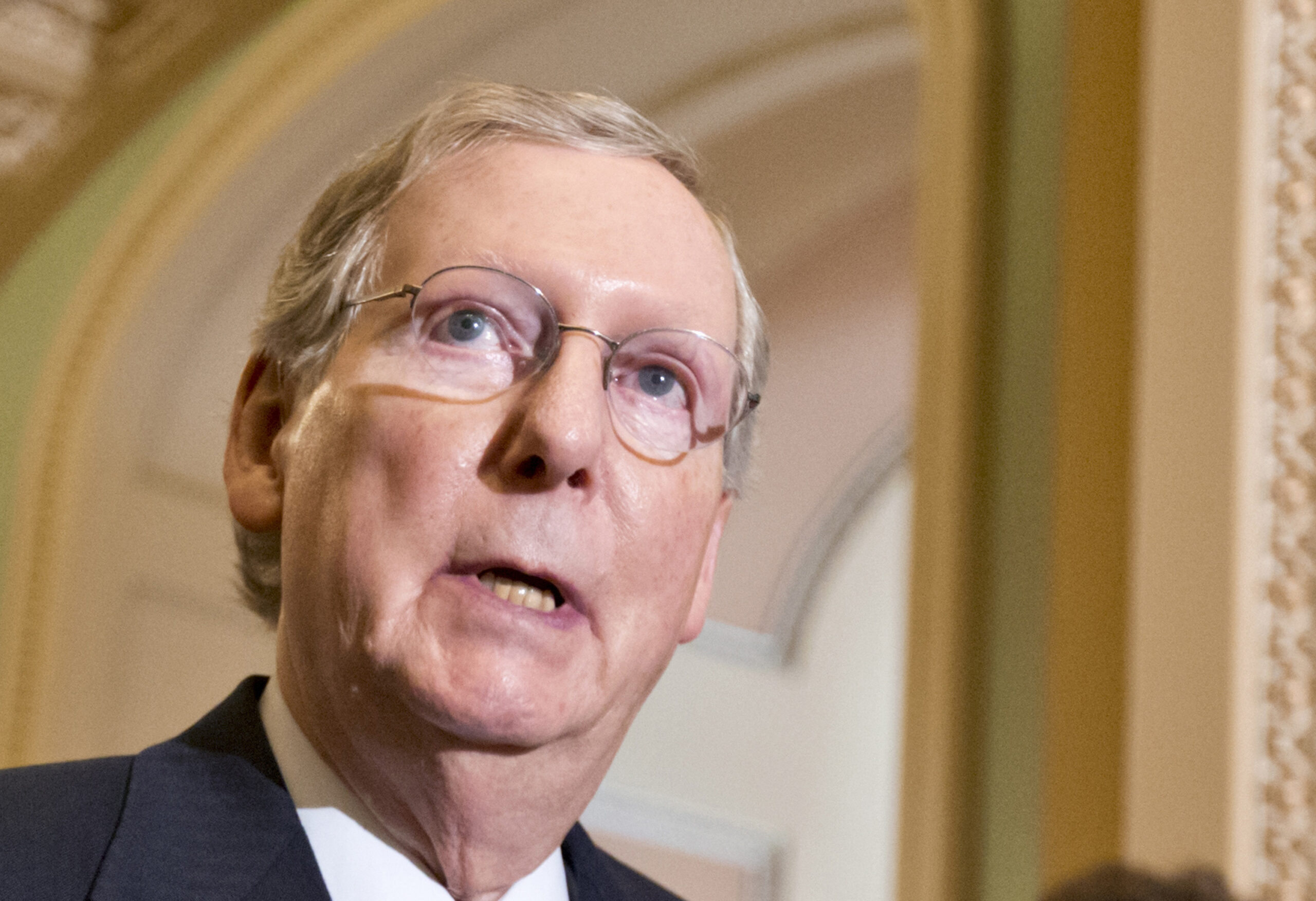 McConnell aide says ‘holding my nose’ in job