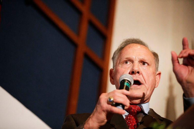 FILE - In this Aug. 15, 2017 file photo, former Alabama Chief Justice and U.S. Senate candidate Roy Moore speaks to supporters in Montgomery, Ala. U.S. Rep. Mo Brooks, who finished third in Alabama's GOP Senate primary, has announced his support for Moore in the heated runoff with Sen. Luther Strange. At a Saturday, Sept. 16, rally in Huntsville, Brooks said he has voted by absentee ballot for Moore. (AP Photo/Brynn Anderson)