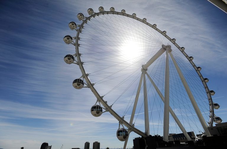 The Las Vegas High Roller at The LINQ begins to operate on Monday, March 31, 2014, in Las Vegas. The 550-foot-tall attraction, which opened to the public on Monday, is the highest observation wheel in the world and features 28 cabins that can accommodate up to 40 people each. (AP Photo/David Becker)