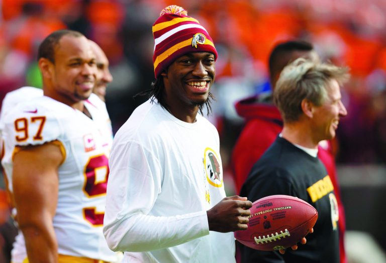 Rick Osentoski/AP
Redskins quarterback Robert Griffin sprained his right knee vs. the Ravens two weeks ago and did not play last week against the Browns.