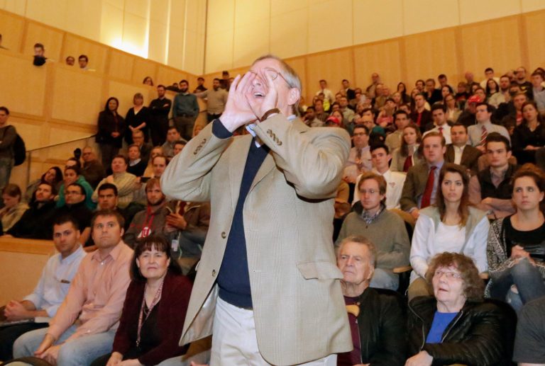 A heckler shouts as former Republican presidential candidate Mitt Romney weighs in on the Republican presidential race during a speech at the University of Utah, Thursday, March 3, 2016, in Salt Lake City. The 2012 GOP presidential nominee had Donald Trump. (AP Photo/Rick Bowmer)