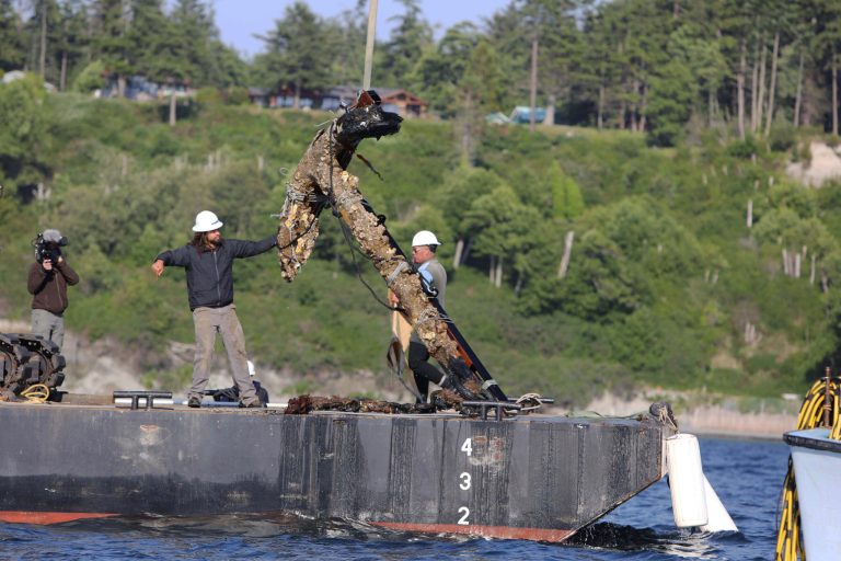 FILE - In this June 9, 2014 file photo, work crews pull out an anchor from Admiralty Inlet off Whidbey Island, Wash. The anchor may be the anchor lost by the HMS Chatham as it explored with Capt. George Vancouver's HMS Discovery in 1792. Texas A&M University on Monday, July 21, 2014, announced the 900-pound anchor has arrived in College Station via truck.  (AP Photo/The Seattle Times, Steve Ringman, File)  SEATTLE OUT; USA TODAY OUT; MAGS OUT; TELEVISION OUT; NO SALES; MANDATORY CREDIT TO BOTH THE SEATTLE TIMES AND THE PHOTOGRAPHER