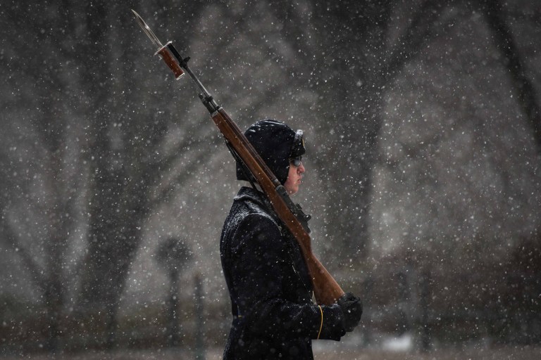 As Winter Storm Jonas hits Arlington National Cemetery the sentinels at the Tomb of the Unknown Soldier continue to perform their solemn duty. (U.S. Army photo by Cpl. Cody W. Torkelson)