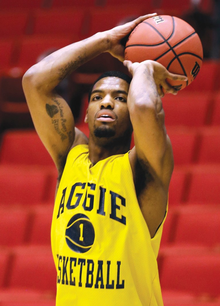 Al Behrman/AP
Adrian Powell and N.C. A&T will play a first-round NCAA tournament game vs. Liberty on truTV on Tuesday night.